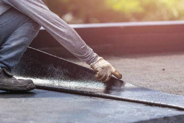 Professional Exterior Waterproofing technician working in Menominee, MI